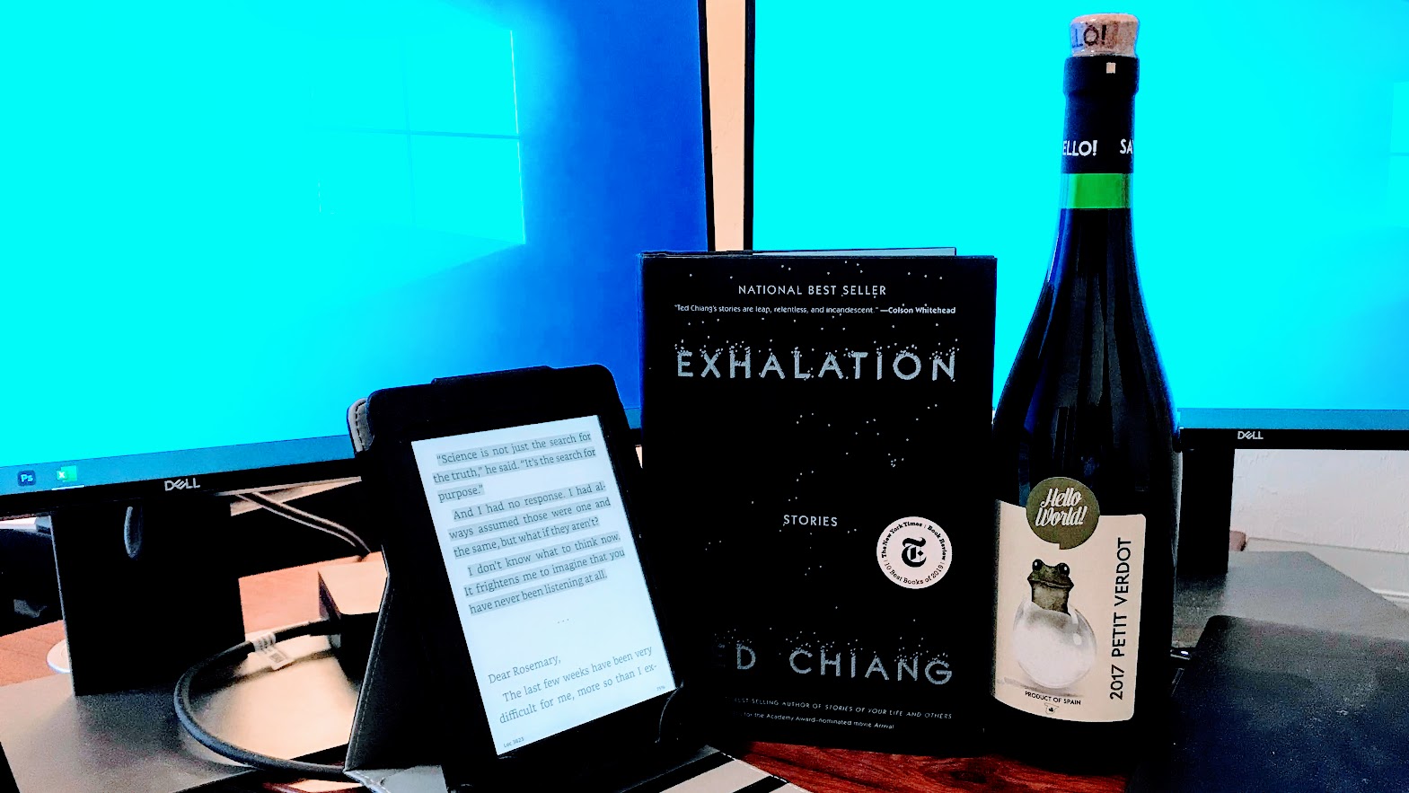 ted chiang exhalation book with wine and computer screens